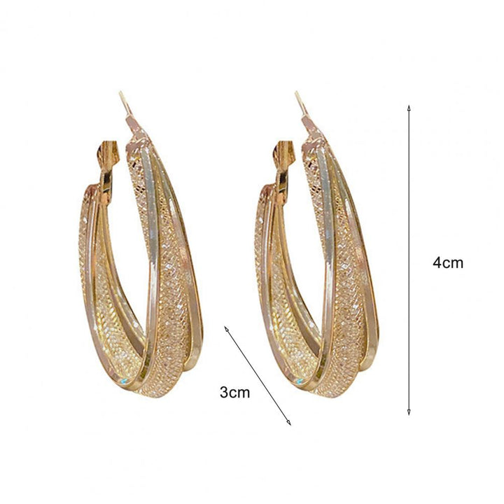 Donna | Oval glossy hoop earrings