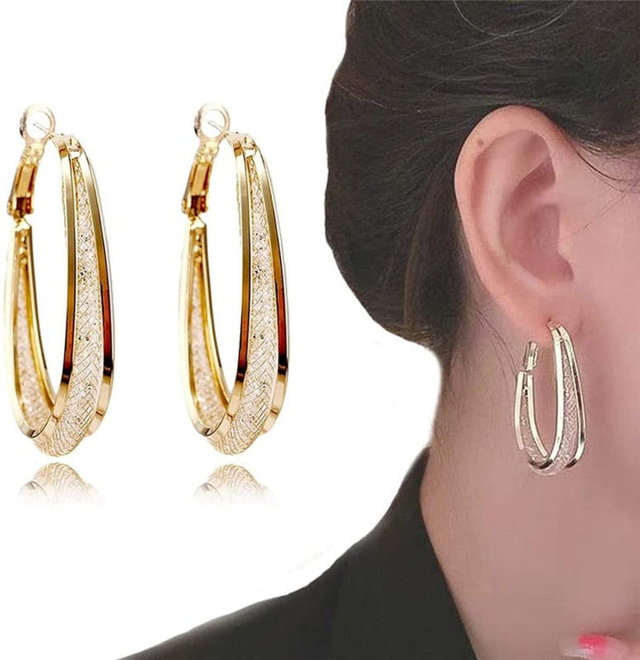 Donna | Oval glossy hoop earrings